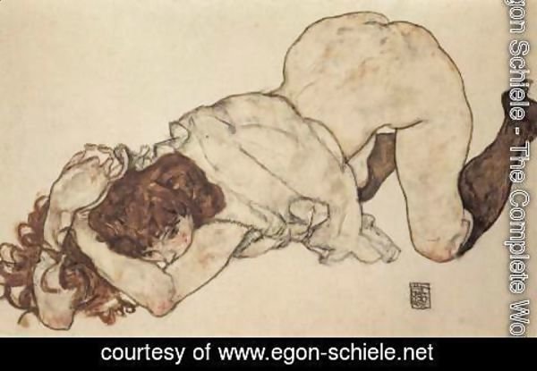 Egon Schiele - Kneeling girl, on both elbows supported