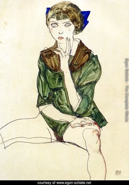 Sitting Woman in a Green Blouse